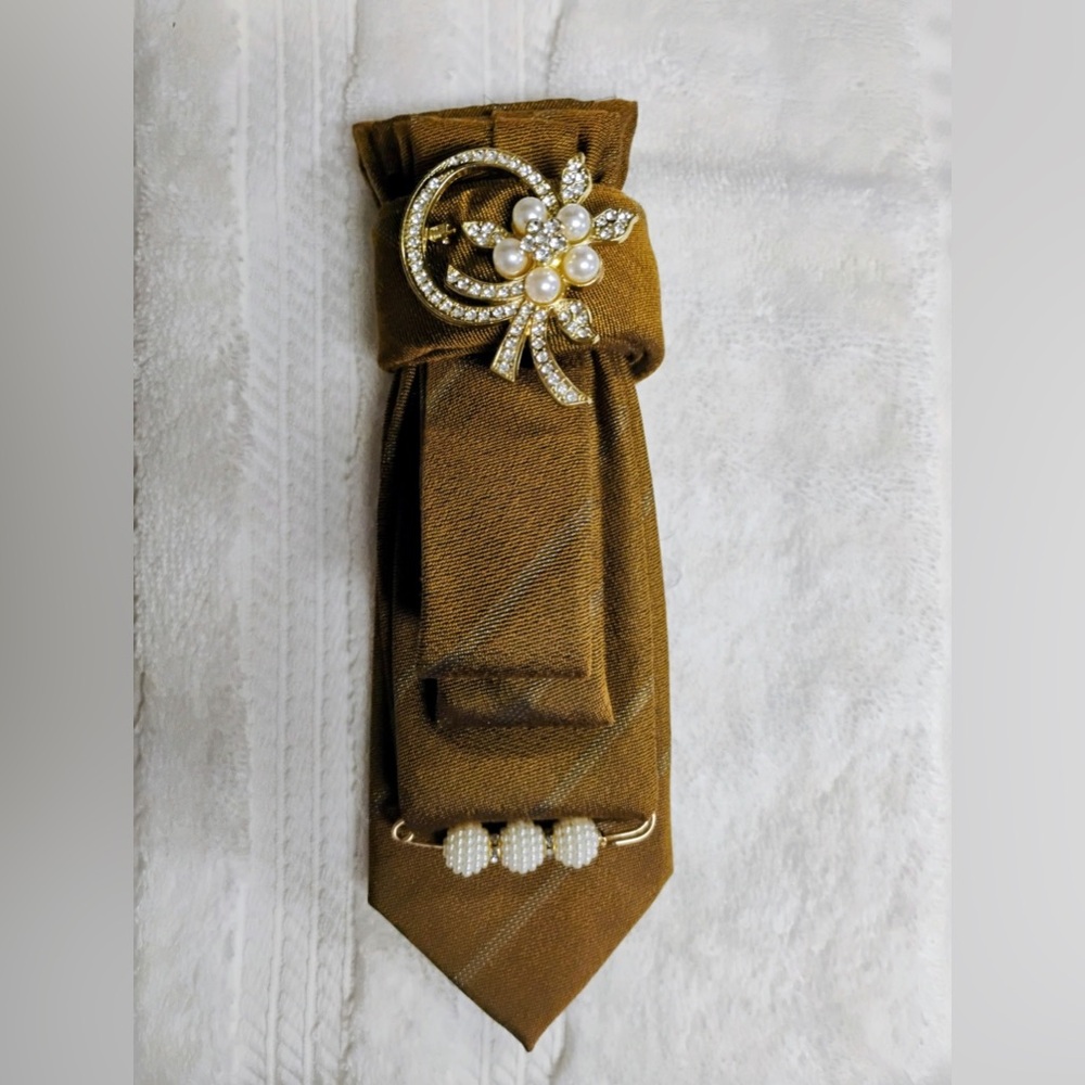 Elegant Brown Tie with Pearl Brooch